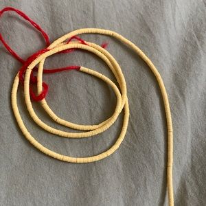 Long strand of yellow African beads